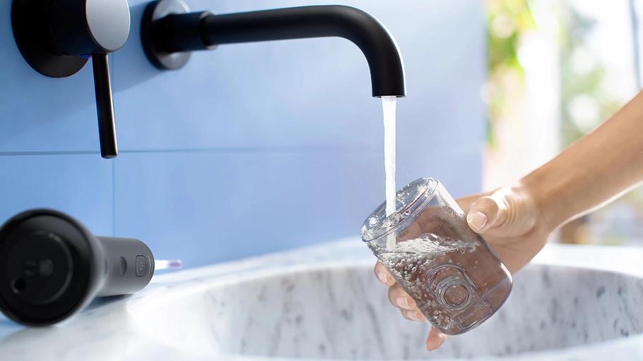 Ирригатор Philips HX3826/33 импульсн. черный фото 8