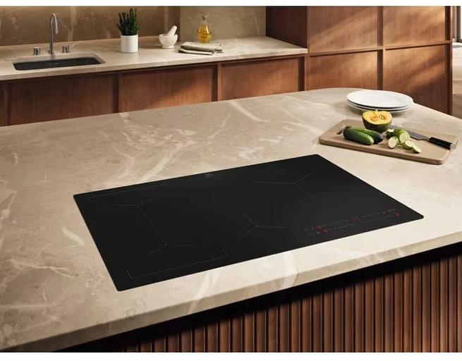Индукционная варочная поверхность Electrolux EIV83443CT черный фото 4