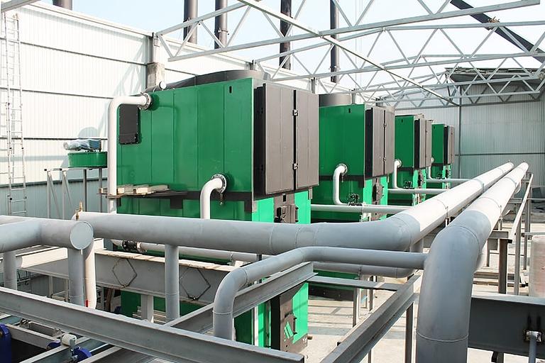 Водогрейные котлы на щепе, опилках, коре, торфе и других отходах фото 6