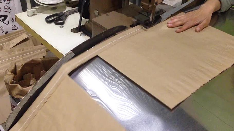 Полуавтоматическая линия по прошивке бумажных мешков ДМП-3 (с автоматическим отрубом ленты) фото 2