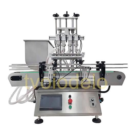 Настольная поршневая машина розлива фото 1