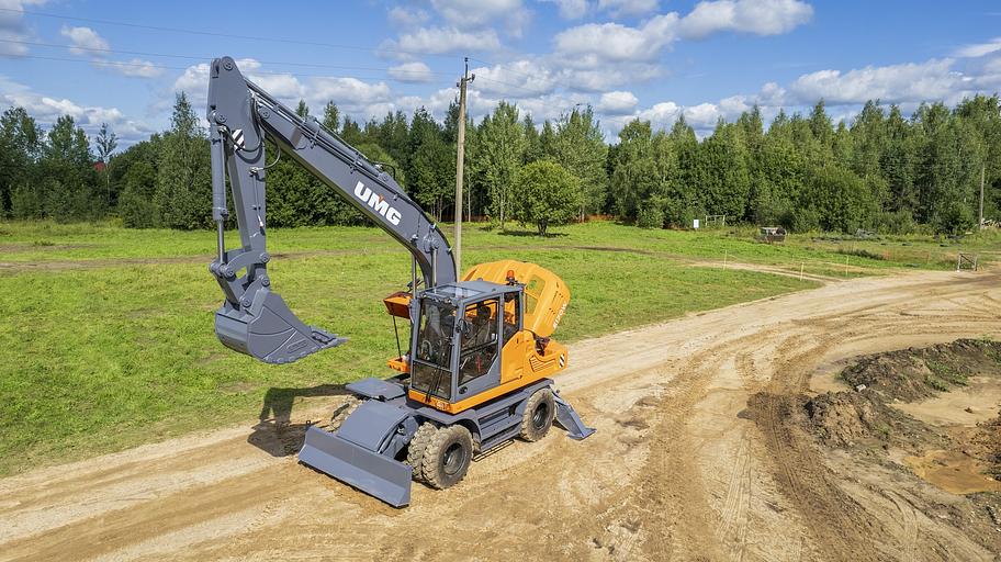 Колёсный экскаватор UMG E170W фото 10